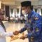 Bupati Luwu Utara Indah Putri Indriani, serahkan SK guru Pegawai Pemerintah dengan Perjanjian Kerja (PPPK) tenaga pengajar (guru) dan tenaga kesehatan formasi tahun 2021 dilingkungan Pemerintah Kabupaten (Pemkab) Luwu Utara